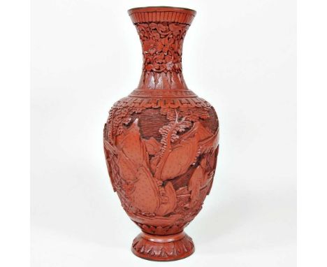 A Chinese carved cinnabar lacquer vase, 26cm highOverall condition looks to be complete. Slightly dirty, with some very light