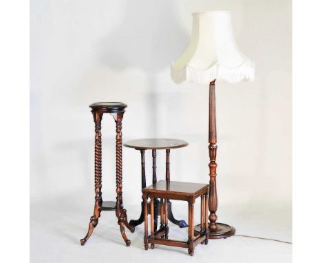 A Victorian walnut occasional table, together with a jardiniere stand, a standard lamp and a nest of tables (4)51w x 51d x 68