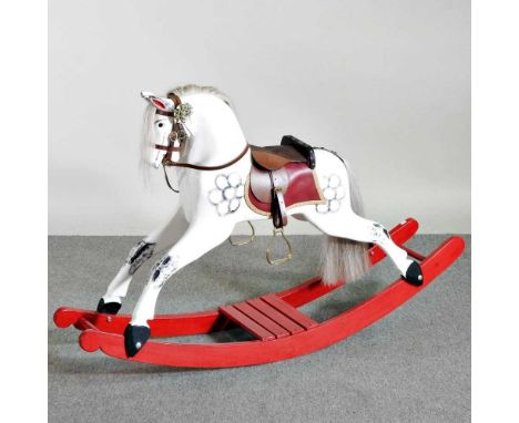 A painted wooden bay rocking horse, on a bowed rocker140w x 32d x 91h cm