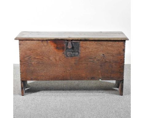 An 18th century oak six plank oak coffer, with a hinged lid88w x 35d x 47h cm