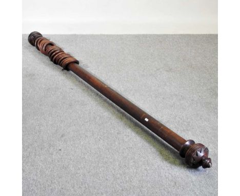 A large wooden curtain pole, 220cm long