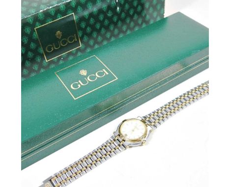 A Gucci ladies wristwatch, having a signed 18mm dial, on a bracelet strap, cased