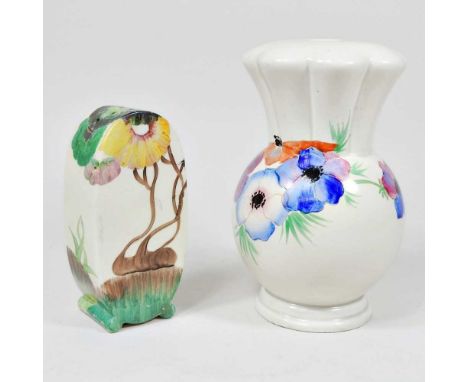 A Clarice Cliff sugar caster, decorated in the Rhodante pattern, together with a Clarice Cliff table lamp base (2)