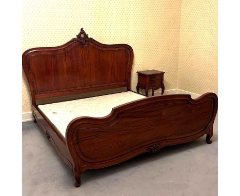 A modern French style cherrywood bedstead, by Frank Hudson Classic Furniture, with a scrolled cresting and slatted wooden bas