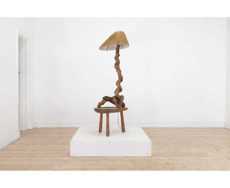 A rootwood and elm floor lamp occasional table,20th century,57cm wide40cm deep156cm highCondition ReportKnocks and old stains