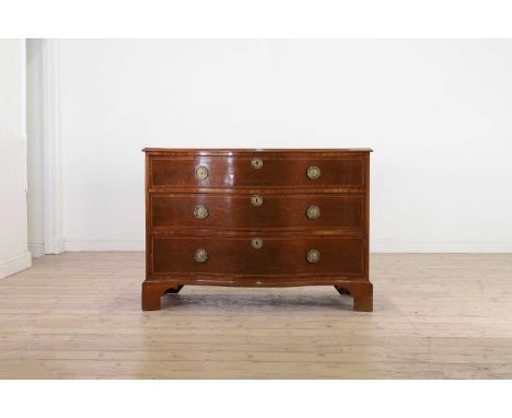 A George III mahogany serpentine commode,third quarter of the 18th century, fitted with three long drawers on bracket feet,12