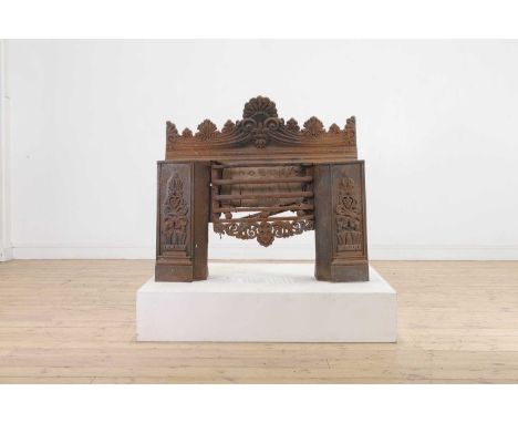 A Regency cast iron fire grate in the manner of George Bullock,c.1820, with all-over anthemion detail, 95cm wide40cm deep86cm