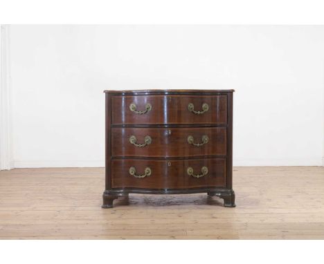 A George III mahogany serpentine commode,c.1770, set with three drawers and raised on ogee bracket feet,110cm wide69cm deep94