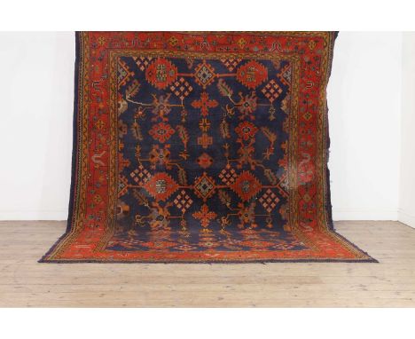 A Donegal wool carpet,early 20th century, Irish, 320 x 234cmThe Estate of the Late Malcolm Frazer.Condition ReportSome loss o