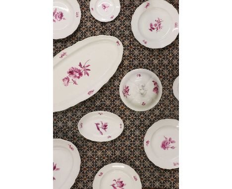 A Meissen porcelain dinner service,decorated in underglaze with pink flowers, comprising forty pieces including ten dinner pl