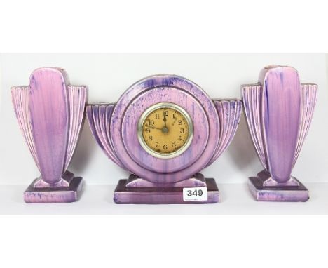 An Art Deco ceramic clock set (clock H 21cm)