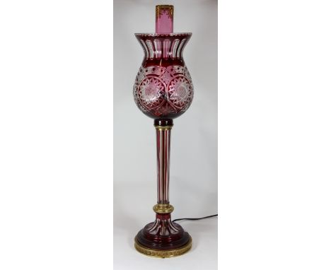 A superb gilt mounted and cut crystal electric table lamp with gilt and cranberry chimney H 80cm