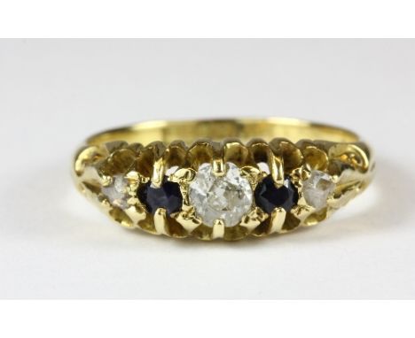 A yellow metal (tested min 9ct gold) sapphire and diamond 5 stone ring (J.5) (worn hallmarks)