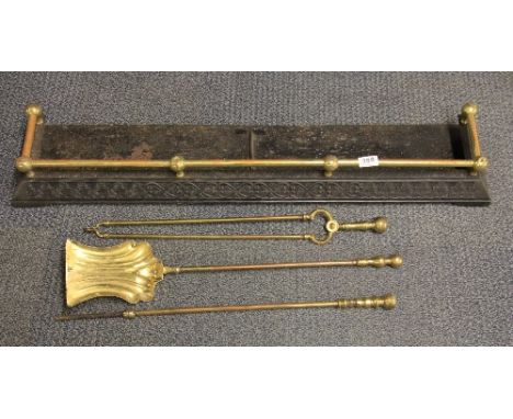 A Victorian cast iron and brass fender and 3 fire tools W 101cm