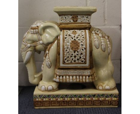 A ceramic elephant stool H 52cm