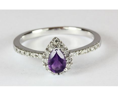 A 10ct white gold amethyst and diamond ring (O)