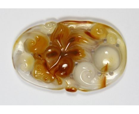 A carved Chinese Chalcedony amulet of a fan tailed fish L 5.5cm