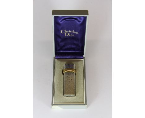 A boxed Christian Dior lighter