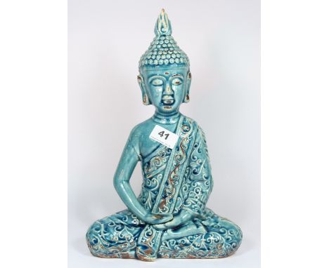 A blue glazed ceramic figure of a seated Buddha H 35cm