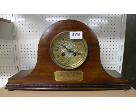 An Edwardian mahogany and brass striking mantle clock with French movement