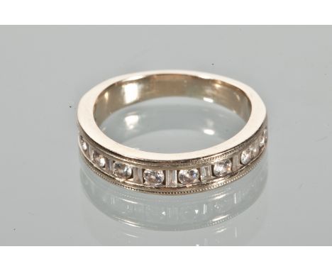 DIAMOND SET HALF ETERNITY RING
set with round diamonds totalling approximately 0.32 carats, unmarked, size K-L
