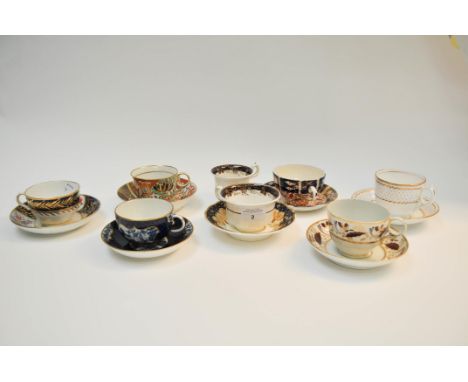 Seven 18th/19th century cups and saucers, being gilt and painted, to include Barr, Worcester, Spode and others