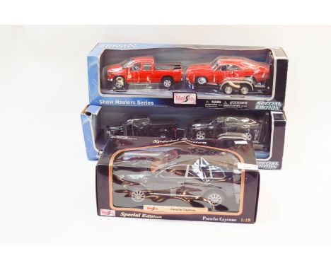 Two Maisto Special Edition Show Haulers series Cars and a Maisto Porsche Cayenne