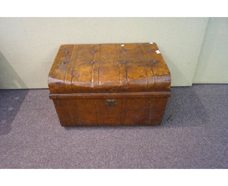 A 19th/20th century metal trunk with domed and stud top
