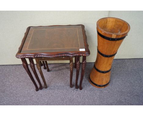 A nest of tables and a coopered stick stand