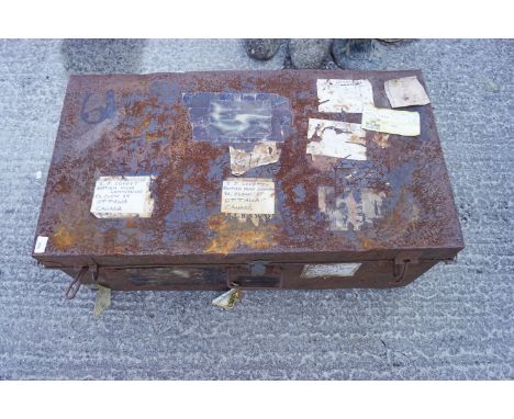 A tin trunk and enamel ware