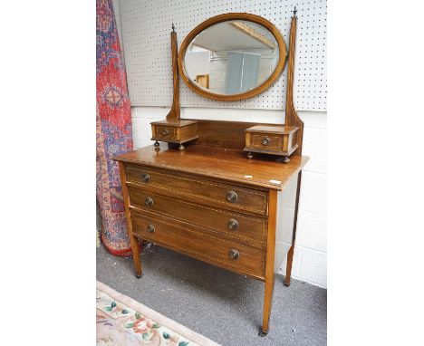 An Edwardian dressing table, in mahogany, 149cm high x 91cm wide x 45m deep