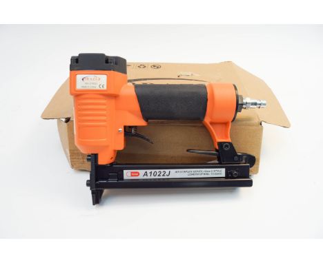 A boxed new Orazio air stapler