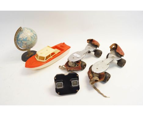 A 1940's Sawyer's Bakelite Viewmaster-Portand, Oregon, a pair of Jaco roller skates, a Chad Valley world globe, a Tico Toys t