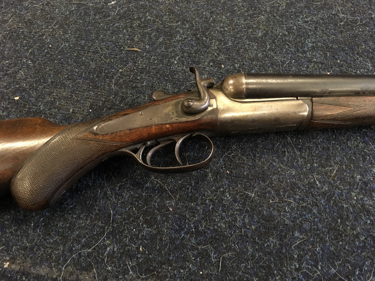 A nineteenth century 12 bore hammer double barrel shotgun, the ...