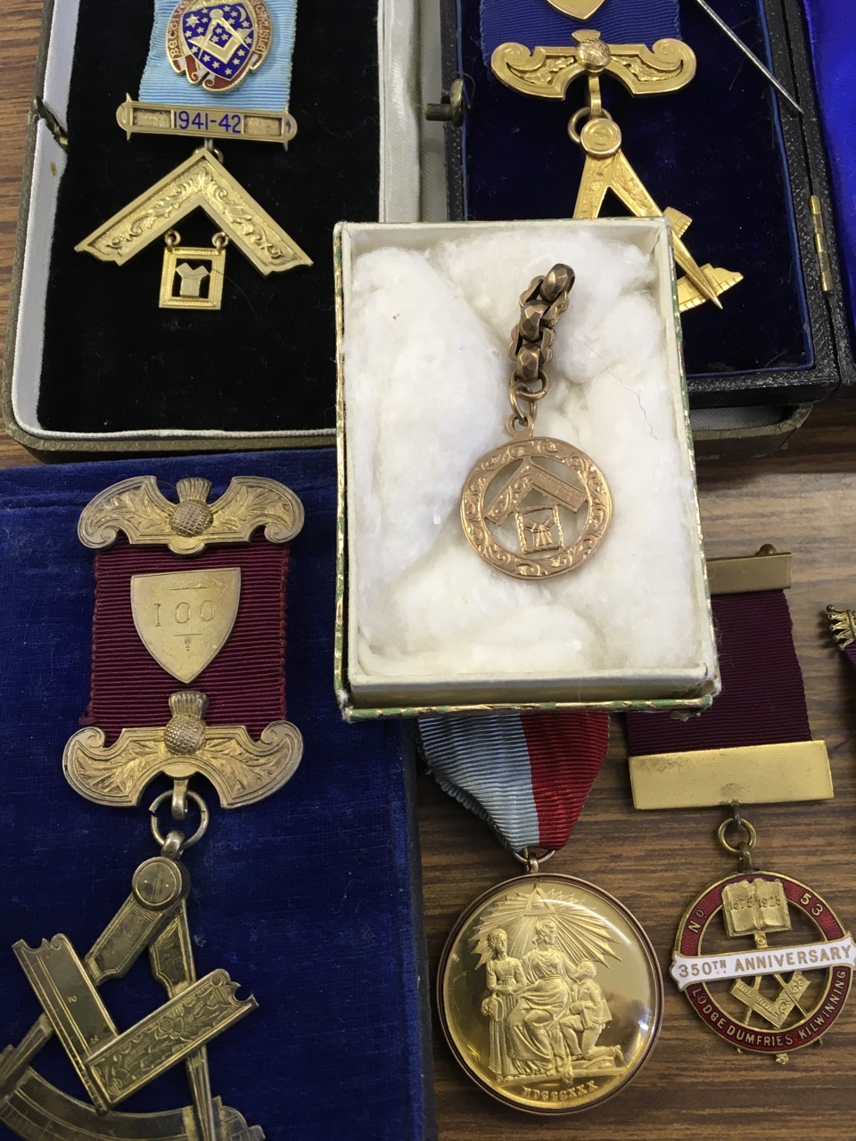 A collection of masonic medals, some 9ct gold, enamelled, silver ...