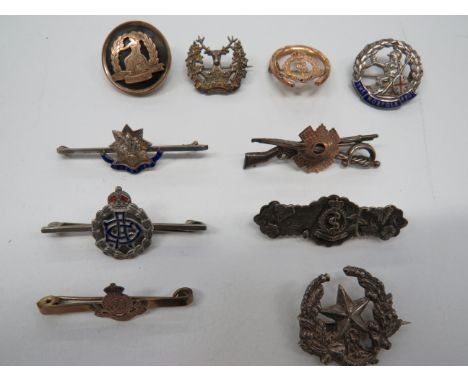 Small Selection of Regimental Lapel Badgesincluding silver gilt HLI ... 9 ct. gold and enamel RAMC .. Gilt and tortoiseshell 