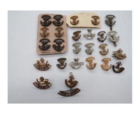 Selection of Somerset Light Infantry Badgesincluding white metal cap badge ... Facing pair white metal 2VB Somerset collar ..