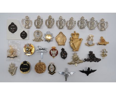 Selection of Various Badgescap badges include KC white metal RAC ... QC bronzed RA ... Gilt and enamel Yorkshire ... QC gilt 