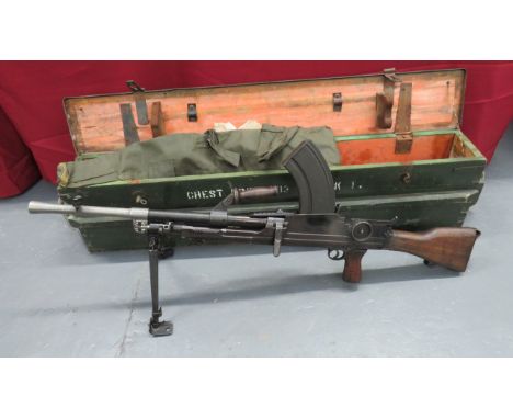 Deactivated MKI* Bren Light Machine Gun.303, 25 inch barrel with built in front flash hider and side mounted sight. Top woode