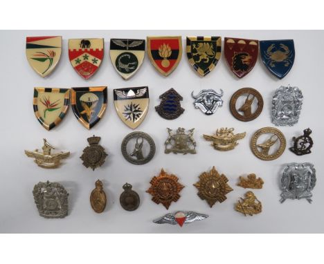 Selection of African Cap Badgesincluding brass Kimberley Reg ... Brass Duke of Edinburgh's Own Rifles .... KC brass V.S V/DRA