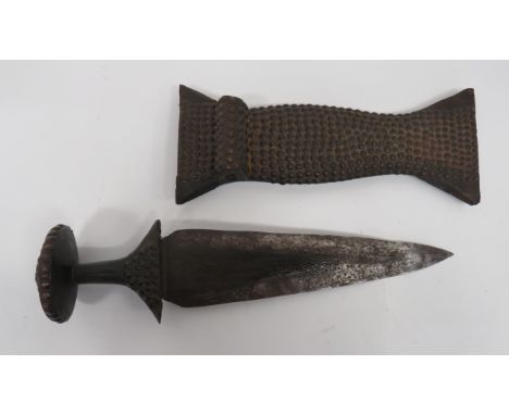 West Congo "Kundu" Short Sword Knife14 inch, double edged, 3 1/2 inch wide blade.  Multi fluted triangular decoration.  Woode