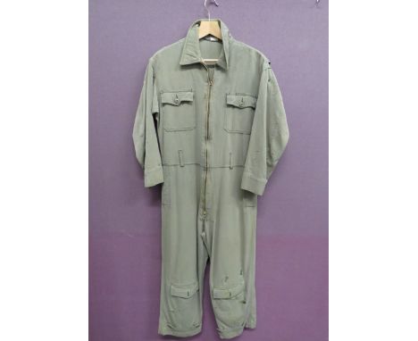 USAAF Flight Suitpale green gabardine suit.  Full length body zip.  Patch chest and leg pockets with buttoned flaps.  Ankle t