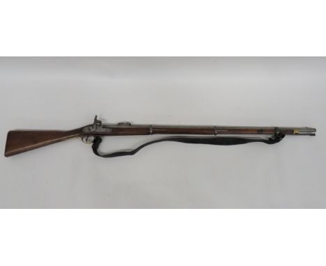 1853 1st Pattern Three Band Rifle.577, 39 inch, rifled barrel.  Rear mounted ladder sight.  Military lock plate marked "1857 