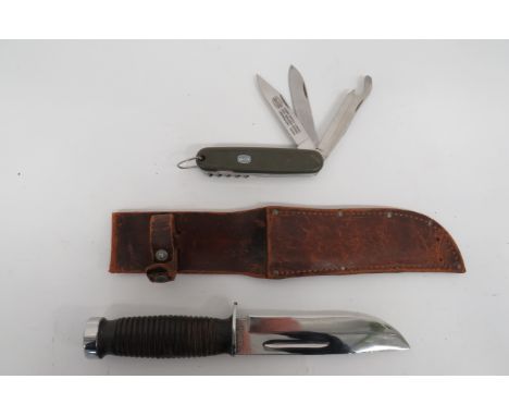 WW2 American "Case" Utility/ Combat Knife6 inch, single edged blade.  Short fuller.  The forte marked "Case".  Steel crossgua