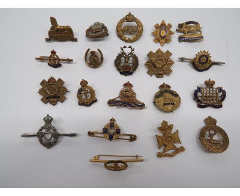 Selection of Regimental Lapel Badgesincluding gilt and enamel Royal Gloucestershire Hussars ... Plated and enamel Gordon High
