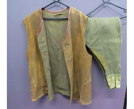 Dispatch Rider's Breeches and Leather Jerkinkhaki cord, wide leg breeches.  Secured at the calf by buttons.  Leather, thigh r