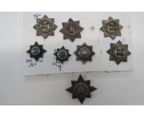 Good Selection of 4th Royal Irish Dragoons Badgesincluding silvered cap badge. Brooch fitting ... Pair silvered, gilt and ena