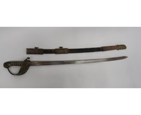 Victorian Royal Navy Officer's Sword27 inch, single edged, slightly curved blade.  Fuller running through the point.  Brass g