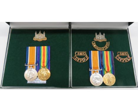 Two WW1 Medal Pairs Cambridgeshire Regimentconsisting silver War and Victory medal named to "5160 Pte C A Oetzmann Cambr.R". 