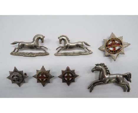 Small Selection of Various Cavalry Badgesconsisting silvered, gilt and enamel 4/7 Royal Dragoon Guards (screw posts) ... 2 x 